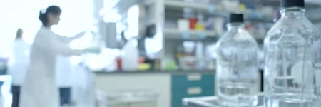 genomics lab with person working in background